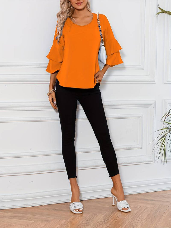 Emily - Schickes Shirt mit Rundhalsausschnitt und eleganten weiten ausgestellten Ärmeln